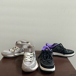 2 pairs of Little kids size 1.5 Nike sneakers